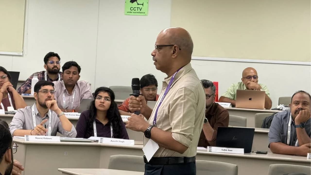A participant putting a question to the room during a SOAR 2026 session