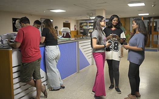 Students at the XLRI library circulation desk